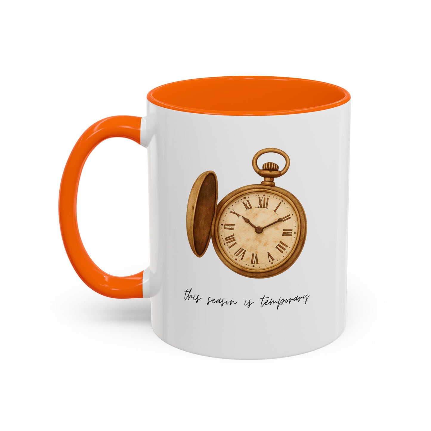 A white ceramic mug with a bright orange handle and interior, featuring a vintage-style illustration of an open pocket watch and the text 'this season is temporary' printed on the front.